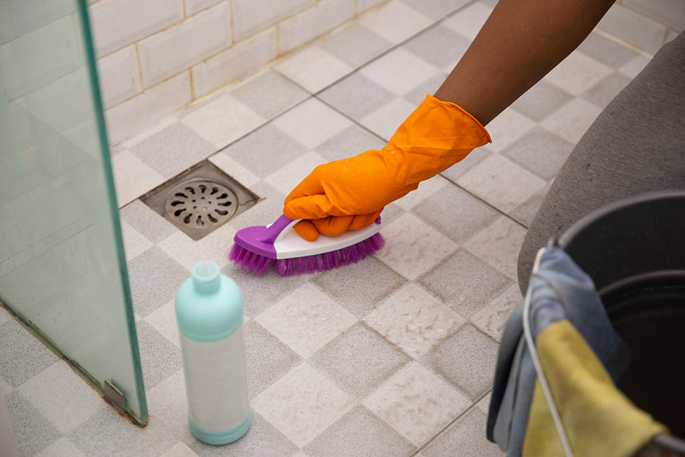 how do you clean dog urine from tile and grout