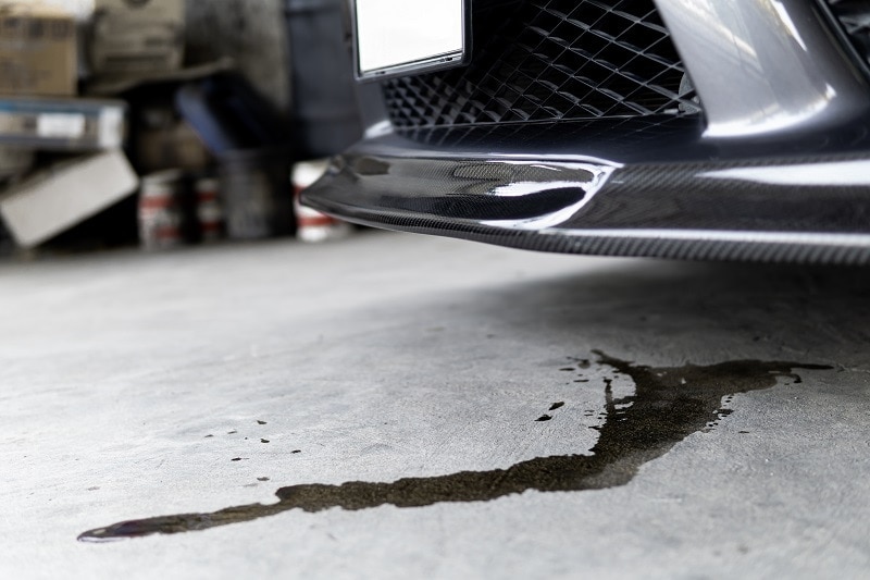 Car Oil Spill Shutterstock NONGASIMO 