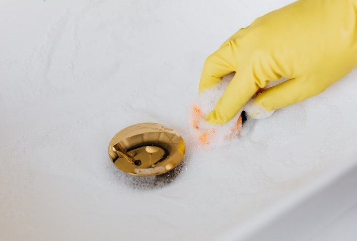 cleaning a bathroom sink drain