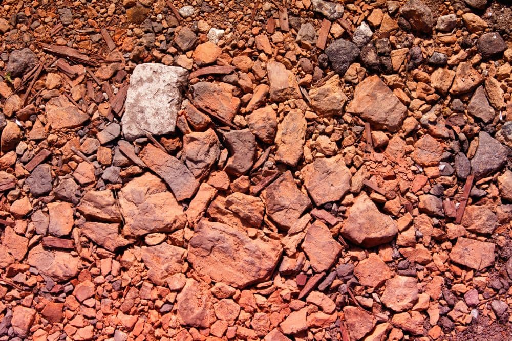 clay road of broken red brick chips and stones