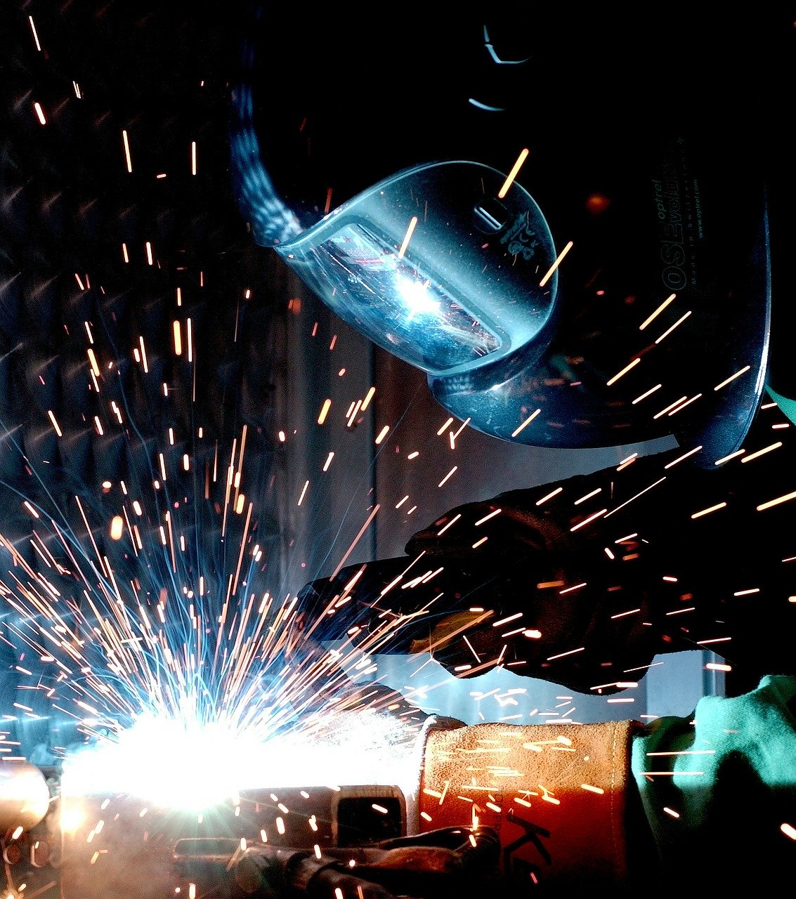 close up person welding