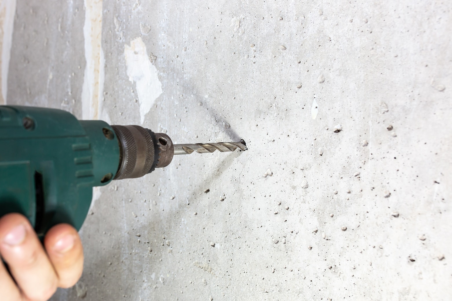 drilling in the concrete wall