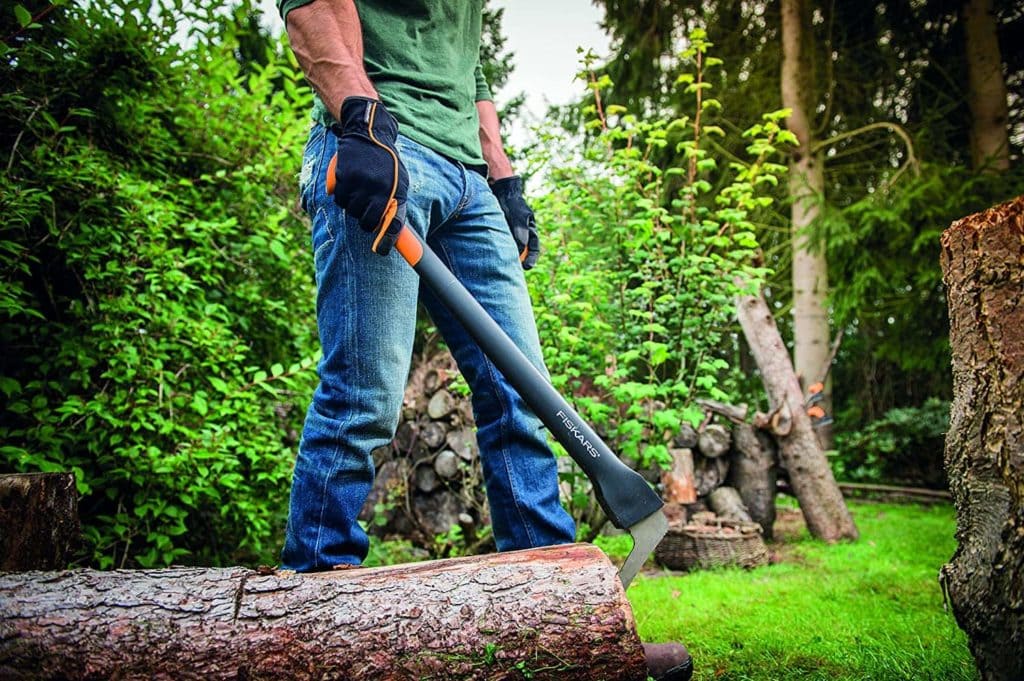 man holding Fiskars Hookaroon 28 Inch