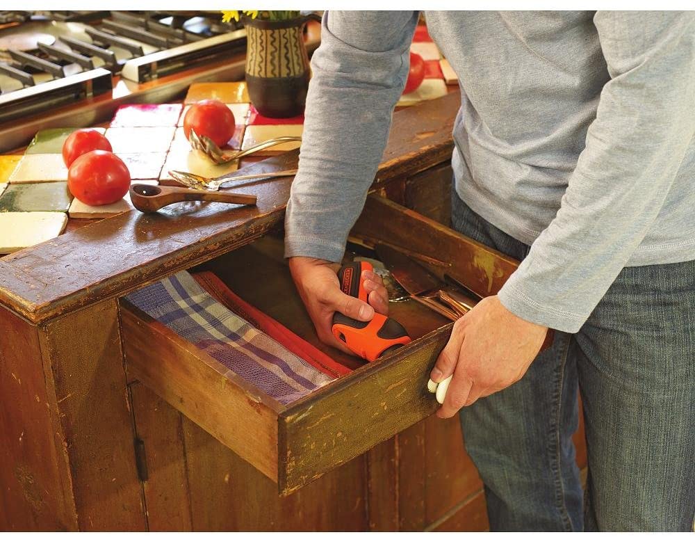 man using BLACK+DECKER BDCS20C MAX Cordless Screwdriver