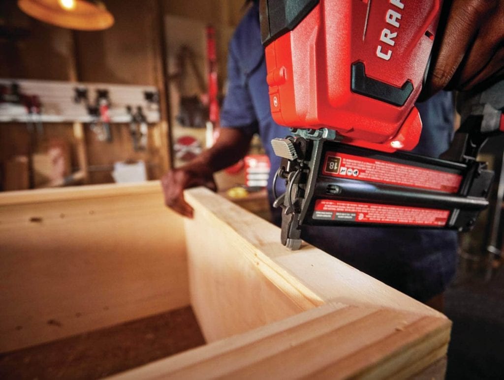 man using CRAFTSMAN CMCN618C1 Cordless Brad Nailer