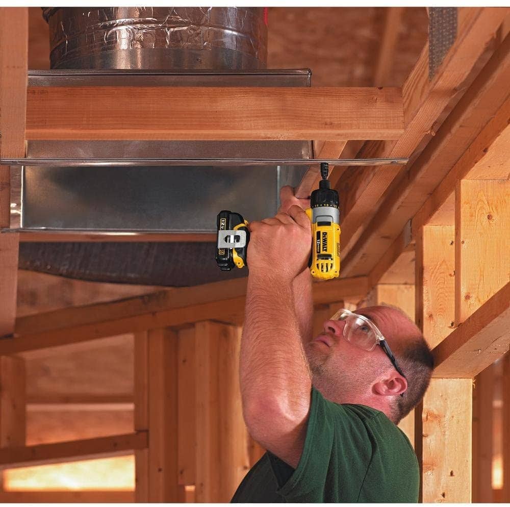 man using DEWALT DCF610S2 Screwdriver