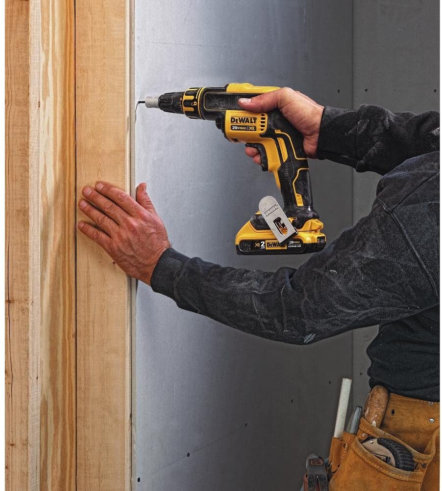 man using DEWALT DCK263D2 XR Drywall Screw Gun & Cut-out Tool