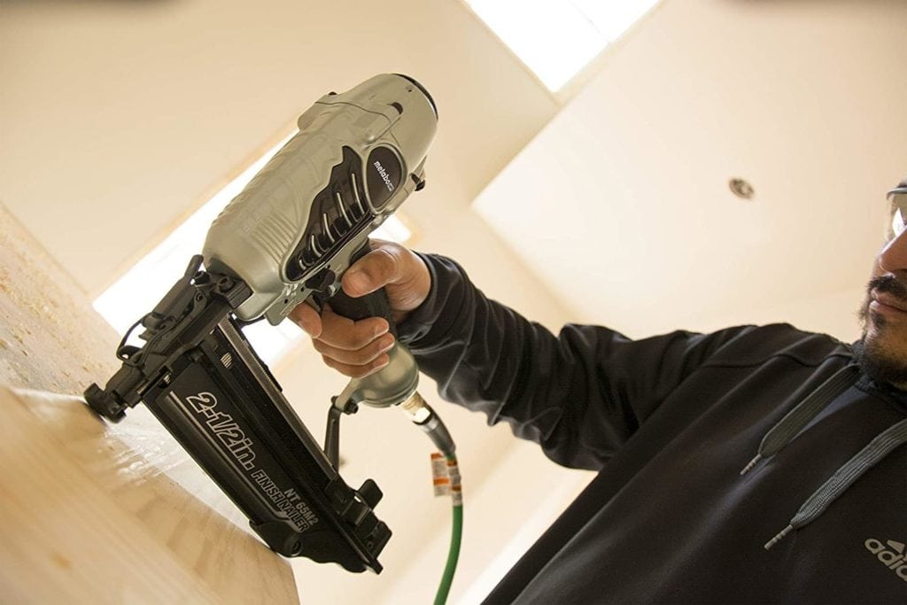 man using Metabo NT65M2S HPT Finish Nailer