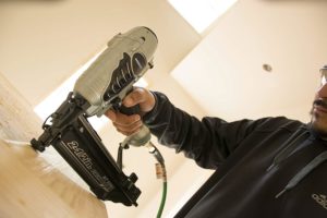 man using Metabo NT65M2S HPT Finish Nailer