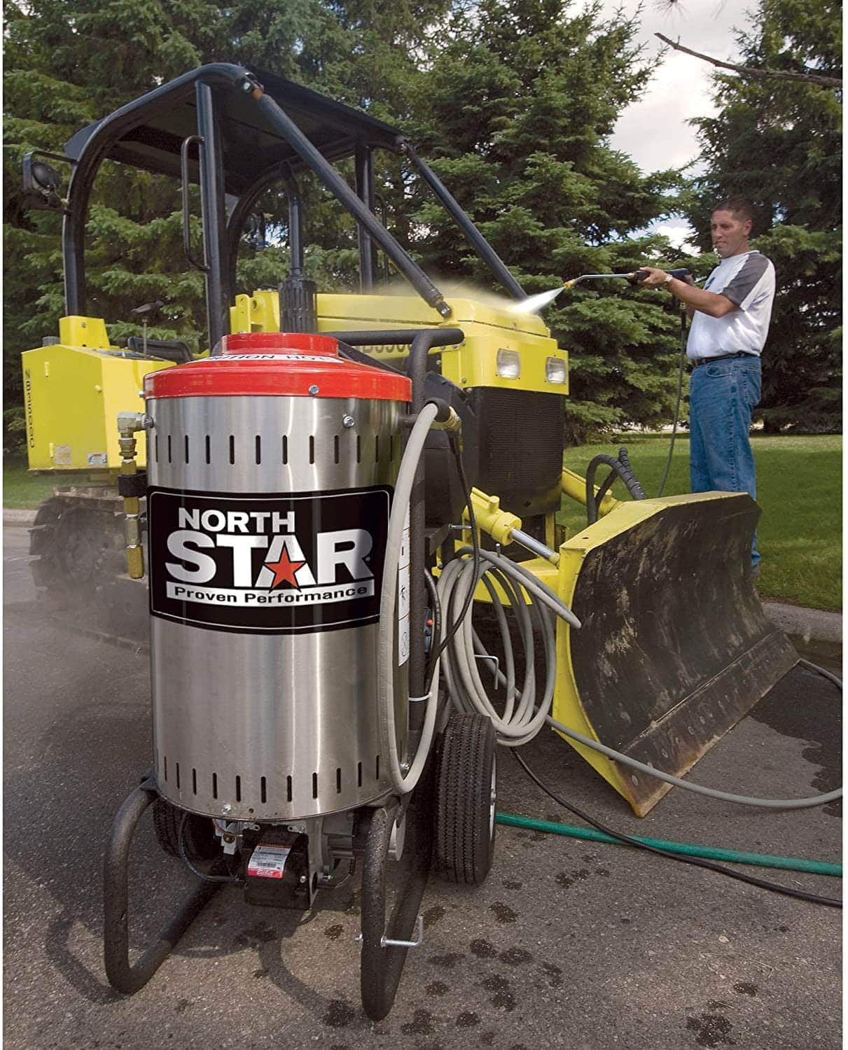 man using Northstar Electric Hot Water Pressure Power Washer