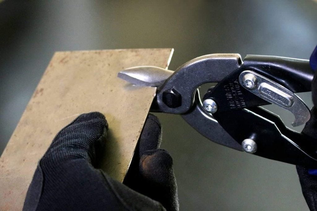 person using MIDWEST MWT-6716B Bulldog Aviation Tin Snip