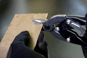 person using MIDWEST MWT-6716B Bulldog Aviation Tin Snip