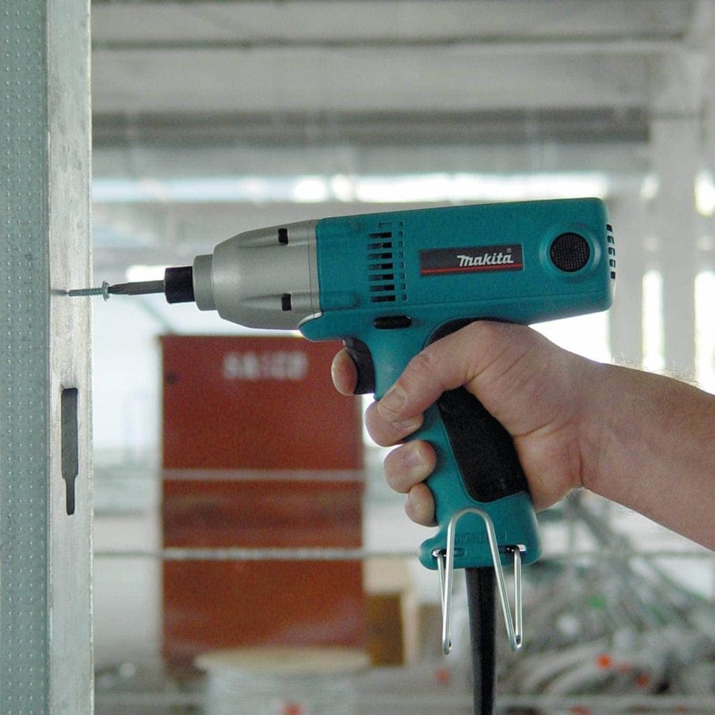 person using Makita 6952 Impact Driver
