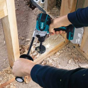 person using Makita XPH07Z Brushless Cordless Hammer Driver-Drill