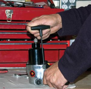 person using Performance Tool W80275 Metric T-Handle Hex Set