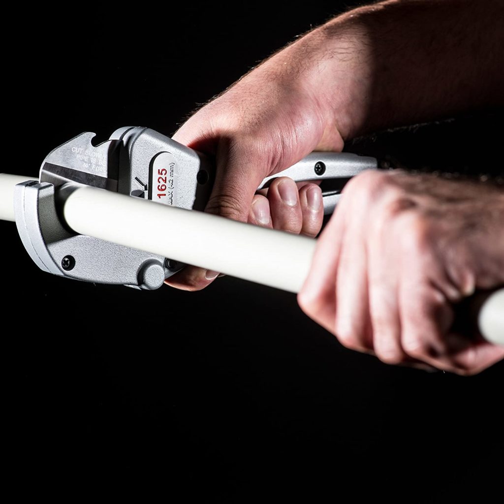 person using RIDGID 23498 Ratcheting PVC Pipe Cutter