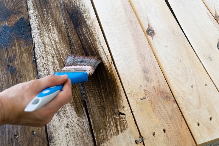 can you paint treated wood right away