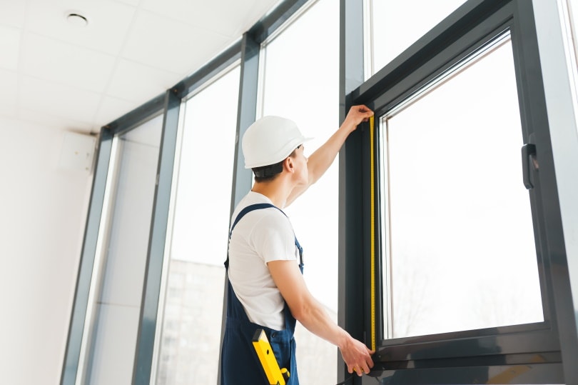 handyman installing window