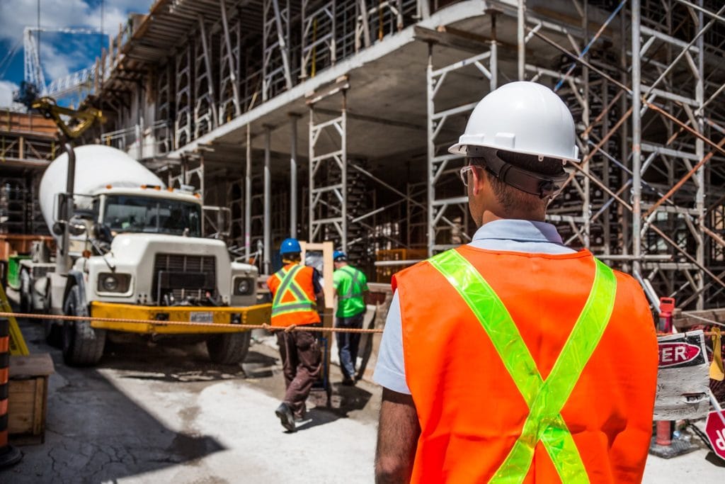 Constructions worker in safety gear on building site