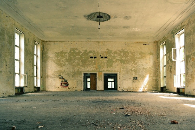 old building with worn out ceiling and floor