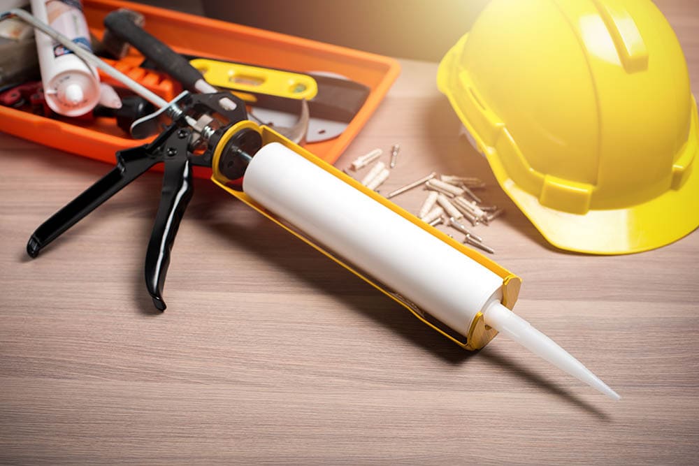 construction sealant with applicator