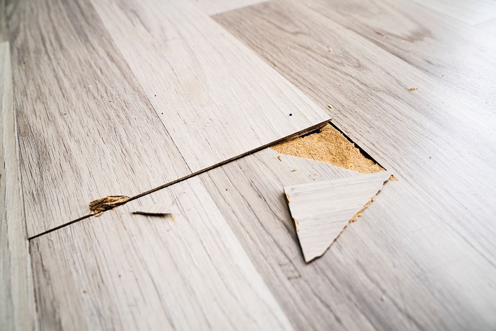 will dog urine damage laminate flooring