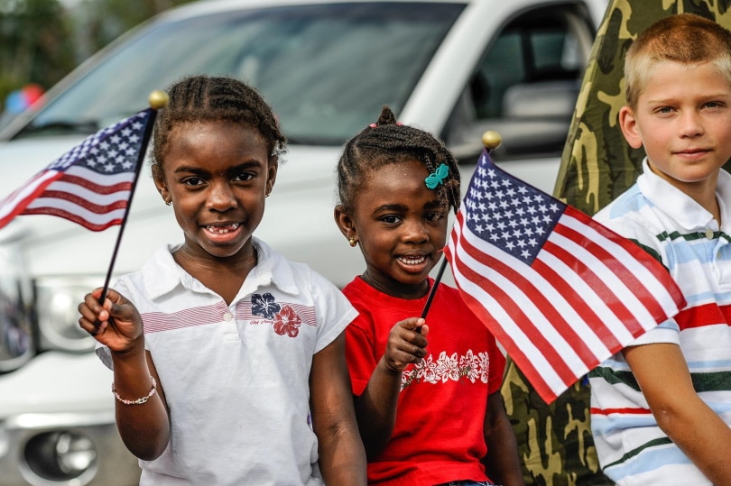 children holding american flag