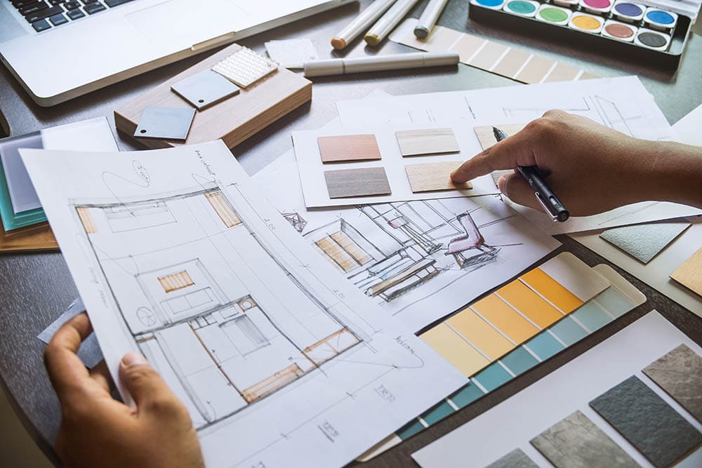 interior designer choosing flooring options