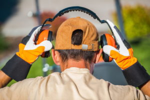 man wearing ear muffs