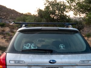 white and black car with roof rack