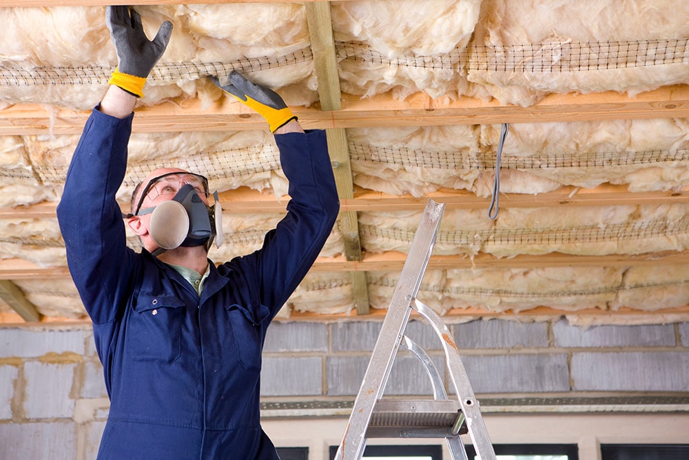 Installing basement insulation_Juice Verve_Shutterstock