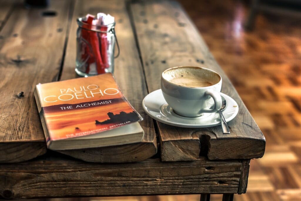 coffee table with cup of coffee and a book
