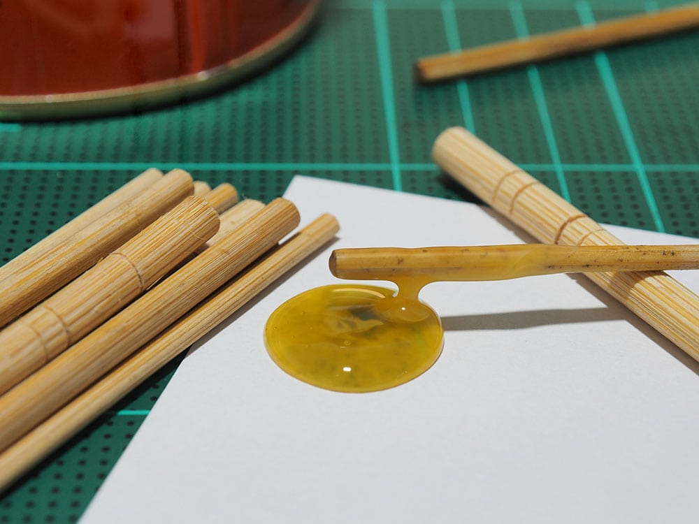 Natural rubber pine sap adhesives on paper