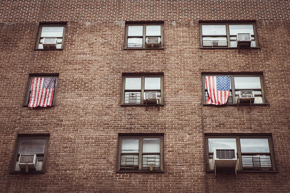 window air conditioners on a building in new york