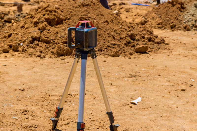 Leveling rotary laser to construction measuring equipment