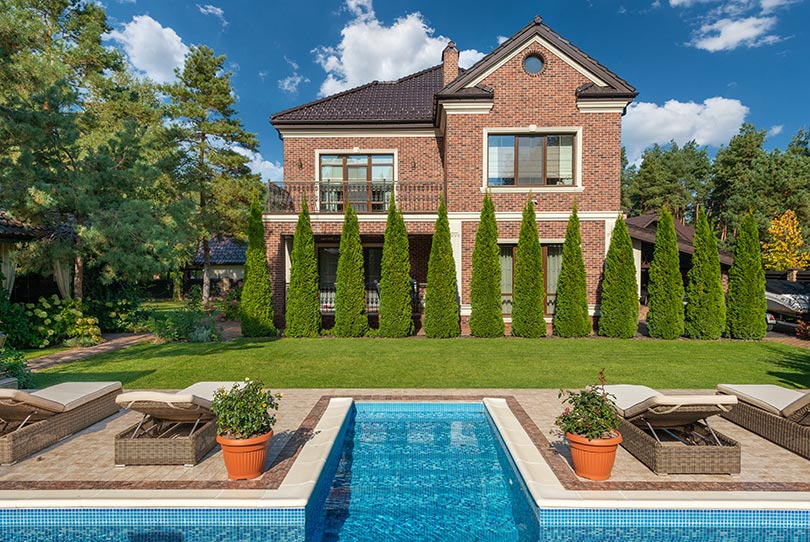 exterior of residential mansion with terrace