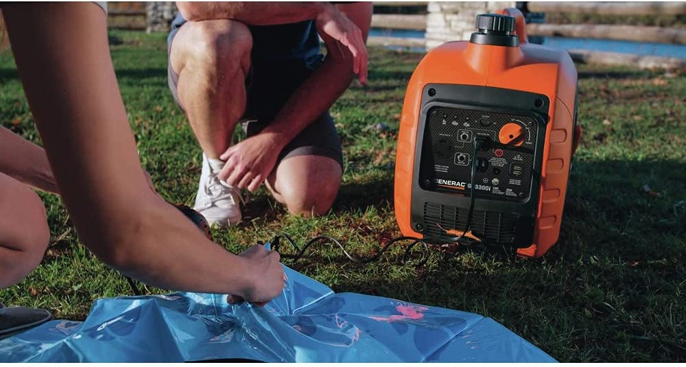 person using Generac GP3300i Portable Inverter Generator