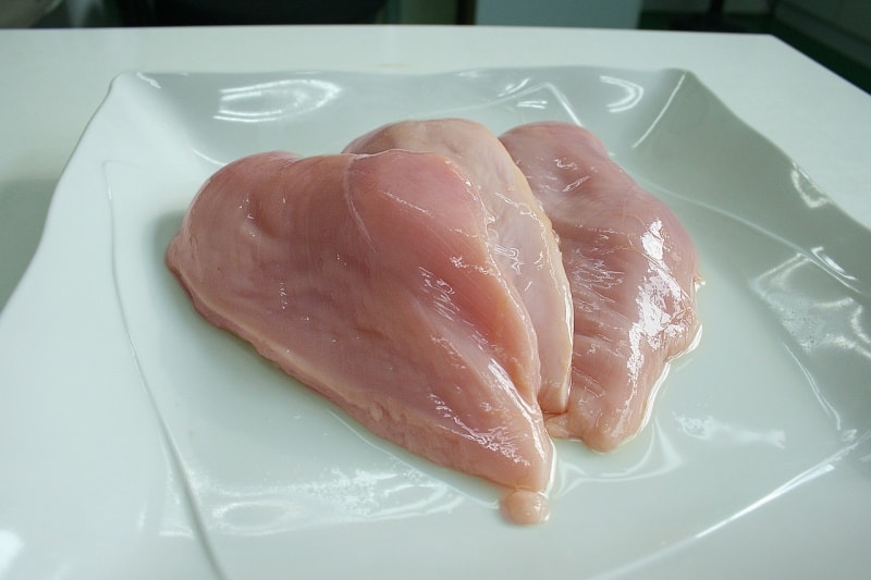 Chicken breasts on a white plate