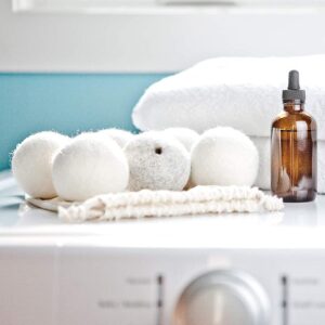 Essential Wool Wool Dryer Balls on top of the dryer