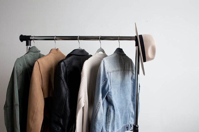 8 DIY Homemade Clothes Rack Plans You Can Make Today With Pictures   Coats On A Rack Amanda Vick Unsplash 768x512 