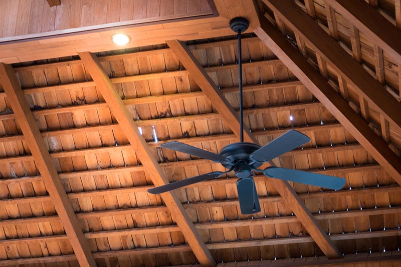 electric ceiling fan hanging in the attic