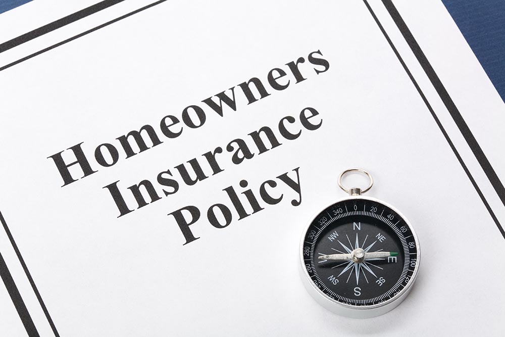 Homeowners Insurance Policy Document Feng Yu Shutterstock 