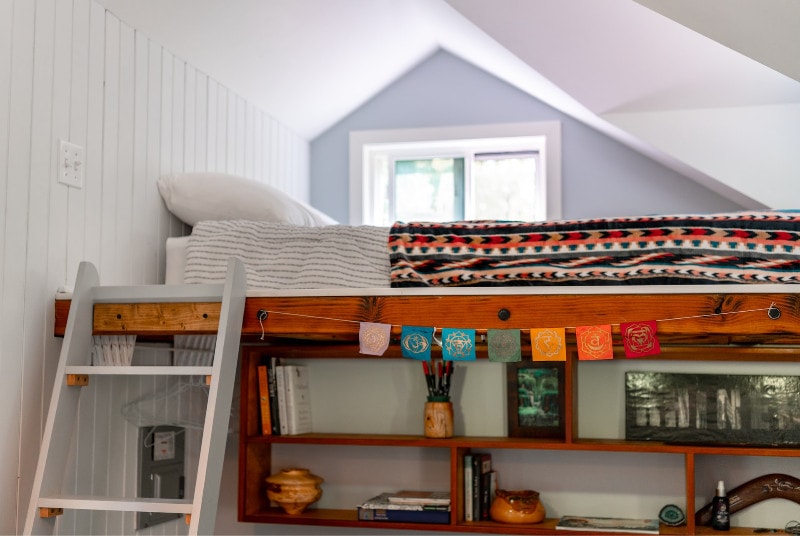 wooden loft bed with stairs