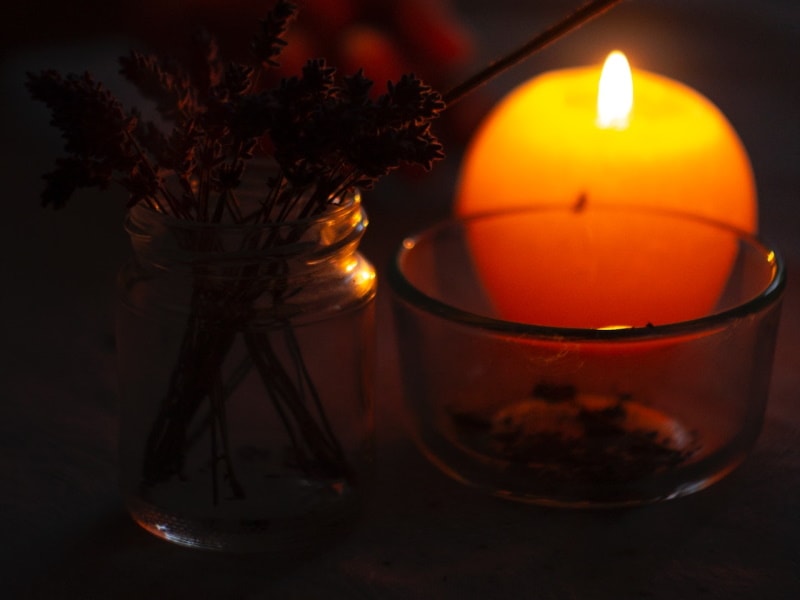 Candle jar with candle outside