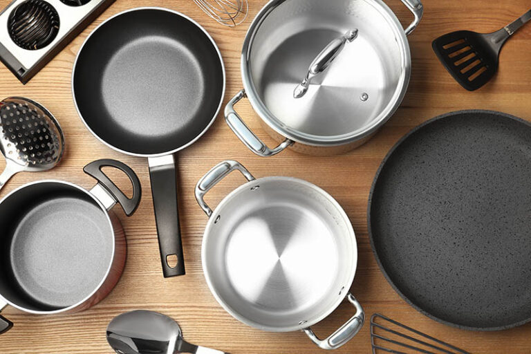 10 Best Cookware Materials Pros Cons 2024 Guide With Pictures   Flat Lay Composition With Clean Cookware On Wooden Background New Africa Shutterstock 768x512 