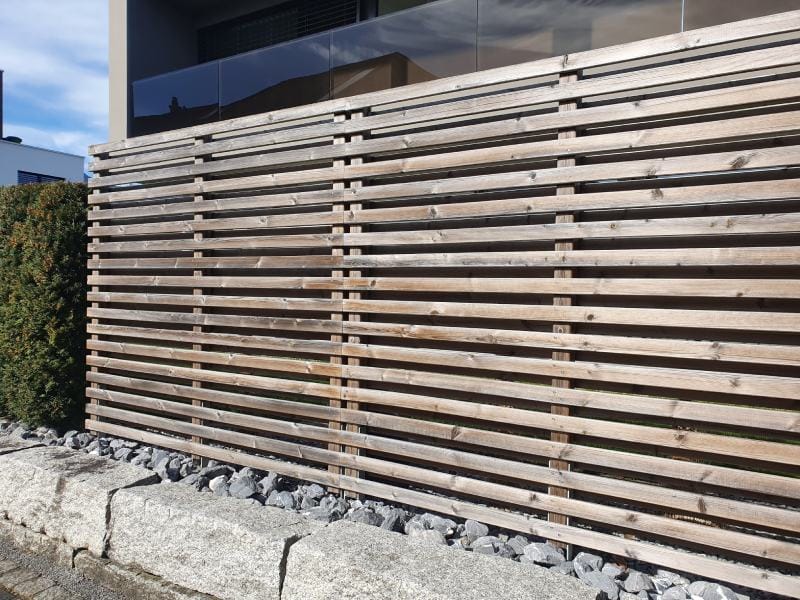 Horizontal slats on the fence or fence of wooden planks