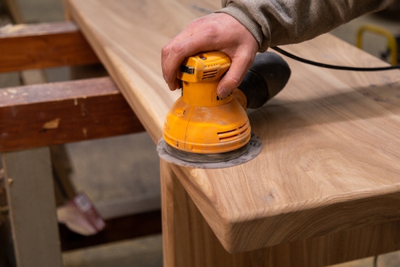 sanding wood with orbital sander