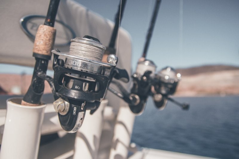 some fishing rods in holders