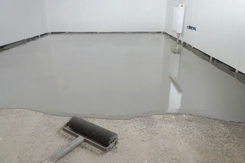 Self-leveling epoxy. Leveling with a mixture of cement floors Concrete dye