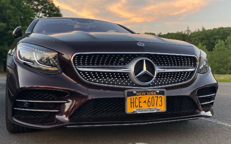 black Mercedes S 560 Coupe car with New York license plates